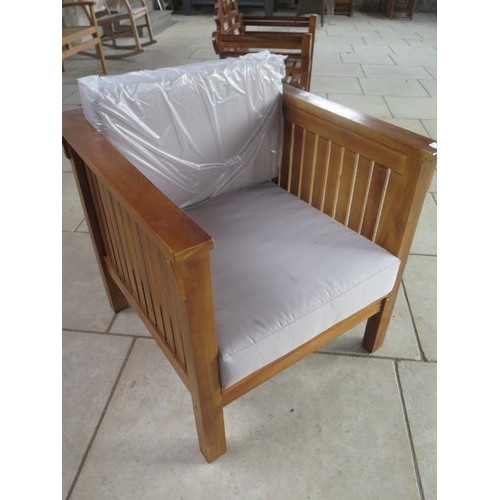 23 - A pair of hardwood garden chairs with cushions