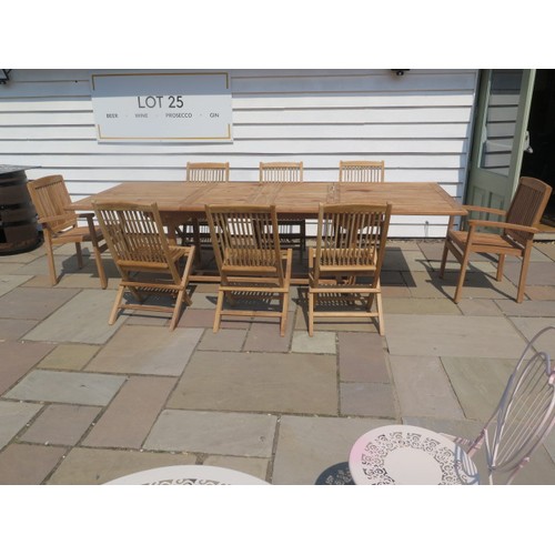 38 - A new boxed teak garden table with 2 armchairs and 6 folding chairs with 2 foldout leaves, extends f... 