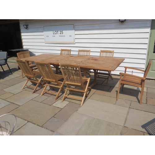 39 - A new boxed teak garden table with 2 armchairs and 6 folding chairs with 2 foldout leaves, extends f... 