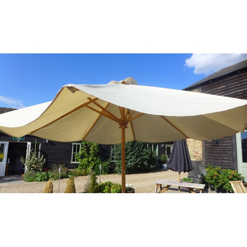 4 - A garden parasol and concrete base 3m