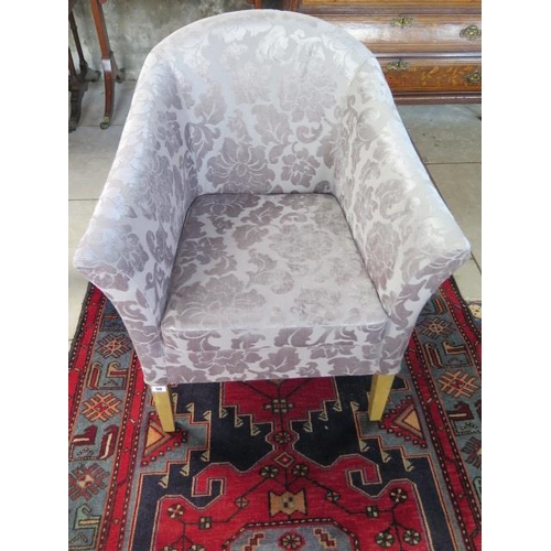 50 - A patterned upholstered tub chair, 80 cm x 70 cm x 70 cm