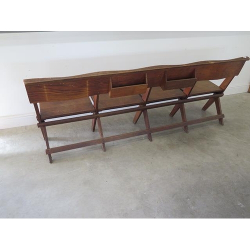 56 - An oak folding seat pew ideal for pubs and restaurants, 211 cm wide x 81 cm tall