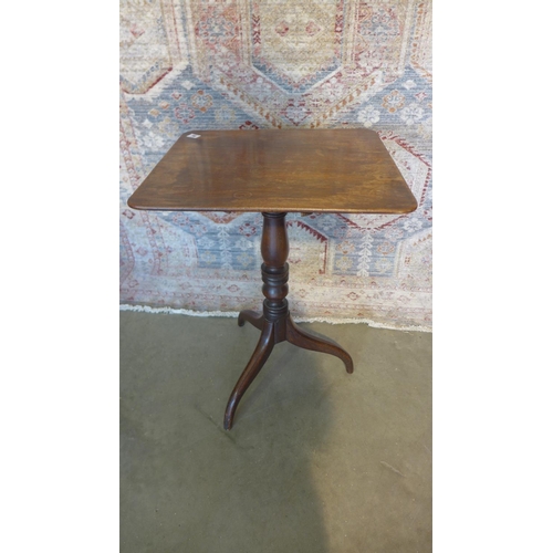 70 - A Georgian mahogany tilt-top tripod side table. 72cm tall. 50 x 45cm.