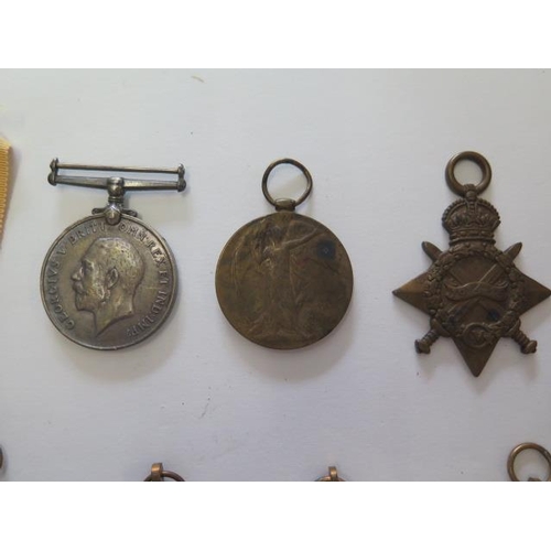 1002 - A WWI trio of medals including 1914-15 star to 11117 Pte/Cpl P Alston R Berks R with a group of 6 un... 