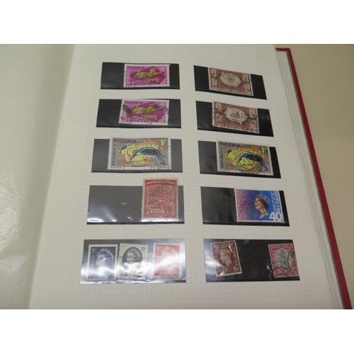 1057 - An assorted collection of world stamps in eleven albums