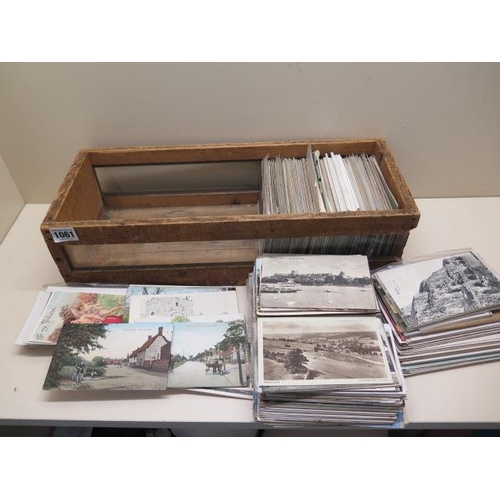 1061 - A box containing approx 200 postcards, many topographical for Cambridgeshire, Bedfordshire and North... 