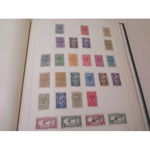 1065 - Four albums of World stamps with early stamps included