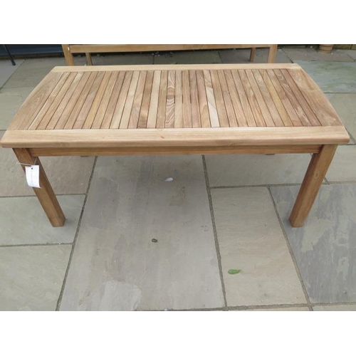 26 - A boxed teak coffee table, new and boxed, 120cm x 60cm