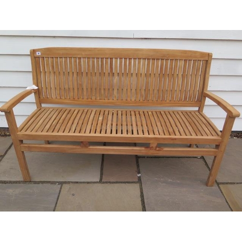 29 - A teak garden bench ex-display as new, 150cm wide