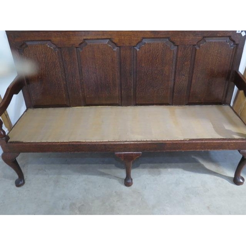 54 - A Georgian oak hall settle with a good patina and in sound condition, 183cm wide x 110cm tall x 64cm... 
