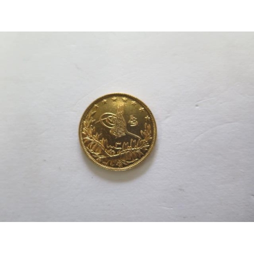 921 - A Turkish gold 100 Kurush coin, approx 7.2gs