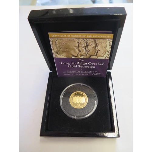 928 - A Elizabeth II gold proof full sovereign 'long to reign over us', dated 2015