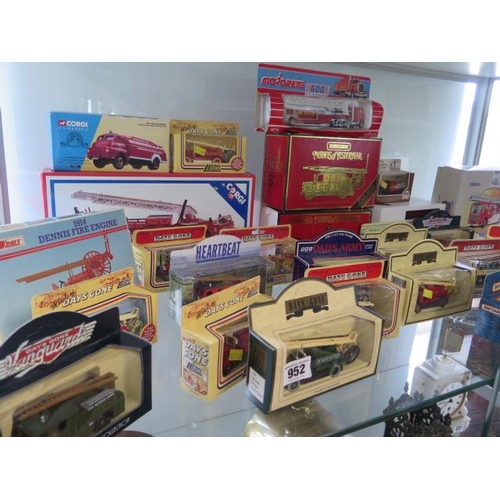 952 - A collection of 30 diecast fire engines including a kit, all boxed