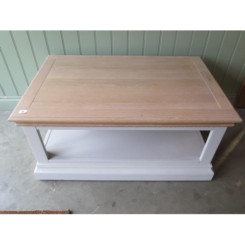 1 - A painted coffee table with an oak top, 97cm wide x 47cm high, ex-display as new