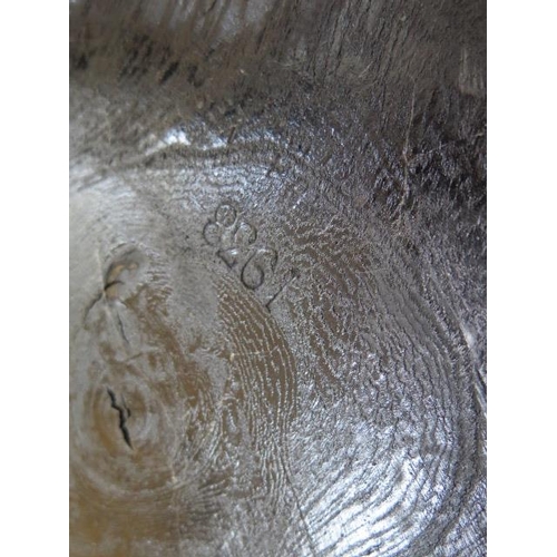 100 - An ash and elm stick back Windsor chair, stamped 1938 to the underside, 106cm high, general age rela... 