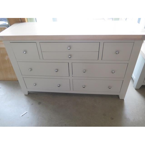 20 - A chest of seven drawers with a chalked oak top, 130cm wide x 78cm high, ex-display as new