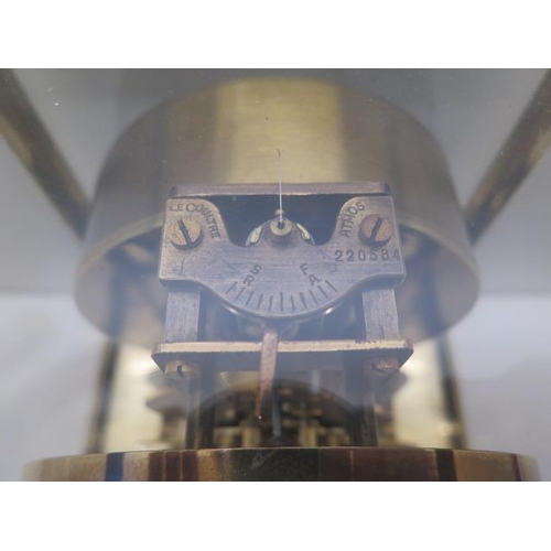 215 - A Jaeger Le Coultre 'Atmos' clock, serial number 220584, housed in a gilt metal rectangular case, 23... 