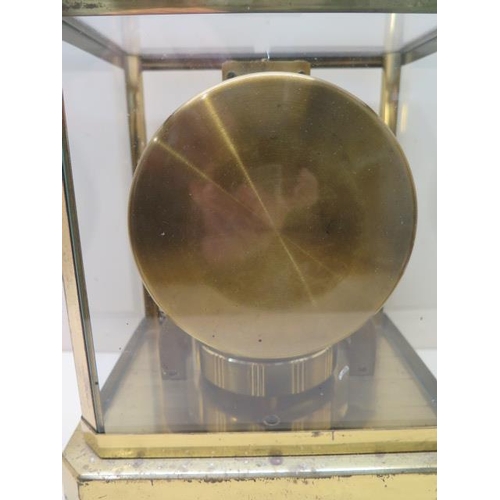 215 - A Jaeger Le Coultre 'Atmos' clock, serial number 220584, housed in a gilt metal rectangular case, 23... 