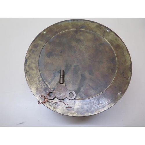 216 - A brass cased ship's wall clock by Lilley and Reynolds Ltd, London E.C.3, slow/fast adjustment and s... 