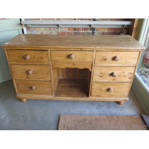 53 - A Victorian stripped, waxed and restored seven drawer dresser base, 88cm high x 152cm x 49cm