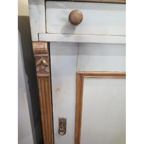 55 - A painted pine cupboard with frieze drawer on bun feet, 82cm wide x 72cm tall x 48cm deep, later pai... 