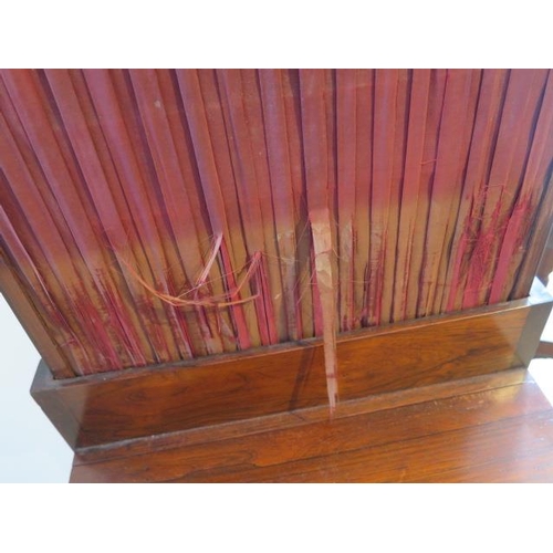 59 - A 19th century rosewood screen with folding leaf, 41cm wide frame x 82cm tall, fabric worn
