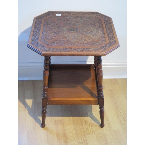 68 - An early 1900s window table with a carved top in, 64cm tall x 51cm x 51cm, restored and repaired con... 