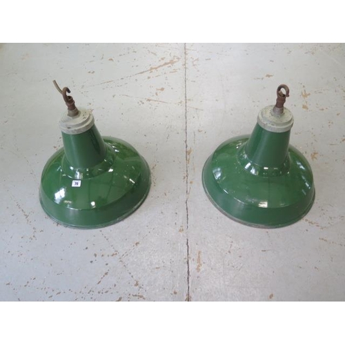 70 - A pair of green enamel industrial ceiling lamps with white enamel interior, 48cm tall x 46cm diamete... 