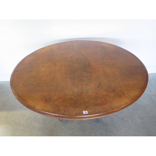 79 - A Victorian walnut tilt top breakfast table on a carved quatrefoil base, 75cm tall x 133cm x 102cm, ... 