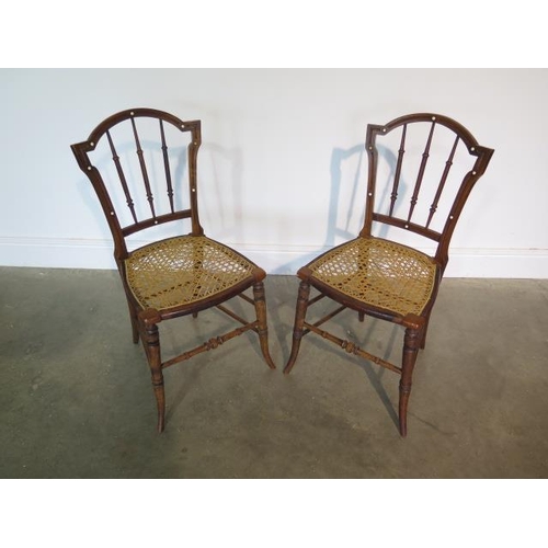 84 - A pair of Victorian beechwood side chairs with canned seats, some wear but generally good