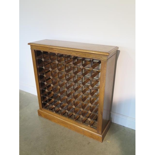 92 - An inlaid burr oak 64 bottle wine rack, made by a local craftsman to a high standard, 98cm tall x 92... 
