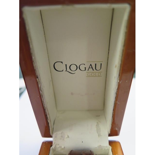 936 - A 9ct gold cased quartz Clogau wrist watch, hallmarked, serial number 00006, with leather strap and ... 