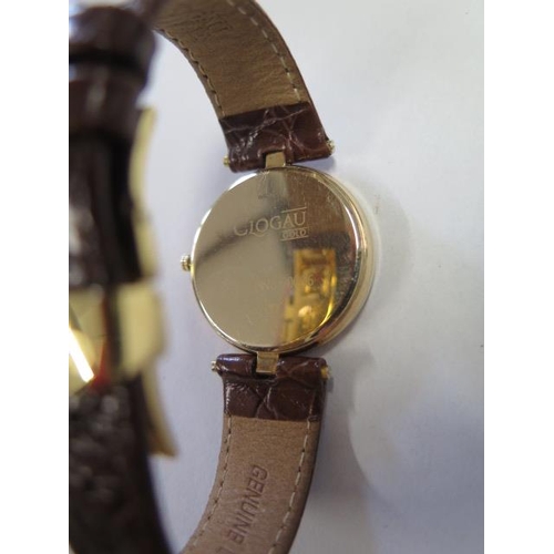 936 - A 9ct gold cased quartz Clogau wrist watch, hallmarked, serial number 00006, with leather strap and ... 