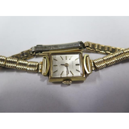 939 - An 18ct yellow gold ladies manual wind wristwatch on a plated strap, not running, total weight appro... 