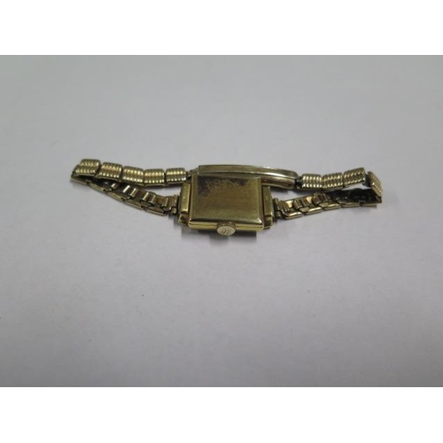 939 - An 18ct yellow gold ladies manual wind wristwatch on a plated strap, not running, total weight appro... 