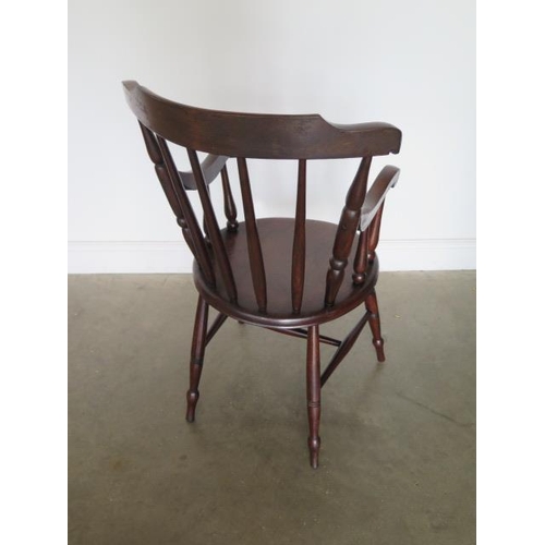 95 - A 19th century elm penny seat armchair in polished condition