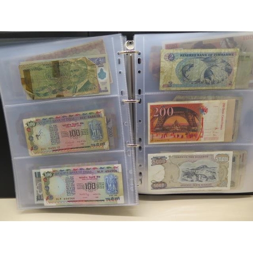 953 - A collection of World bank notes, approx 100, in a black ring binder