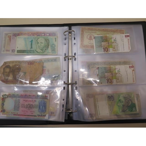 953 - A collection of World bank notes, approx 100, in a black ring binder