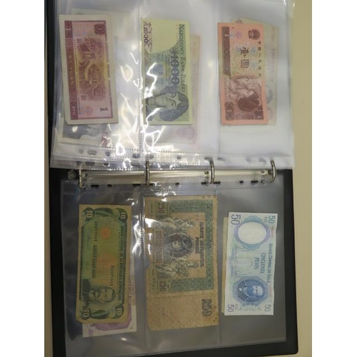 953 - A collection of World bank notes, approx 100, in a black ring binder