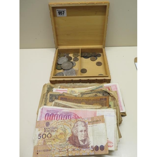 957 - An American silver dollar, dated 1921, further coins and world bank notes. Age related wear througho... 