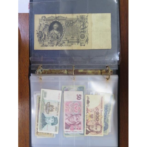 958 - An album containing a vintage banknote collection