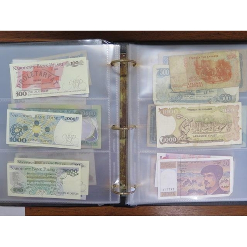 958 - An album containing a vintage banknote collection