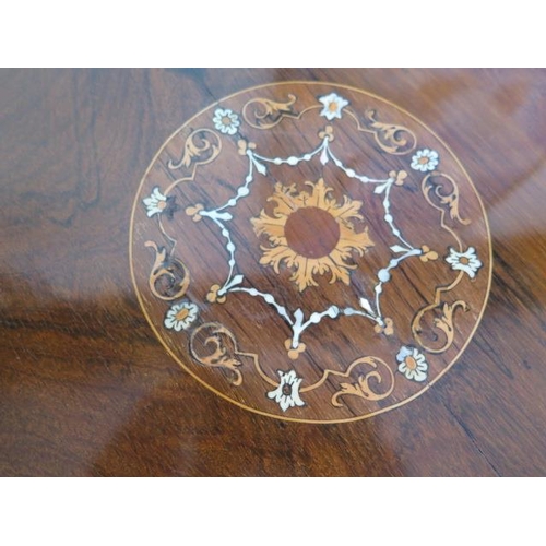 113 - An Edwardian fine rosewood tripod table with inlaid shaped top on three turned and reeded column and... 