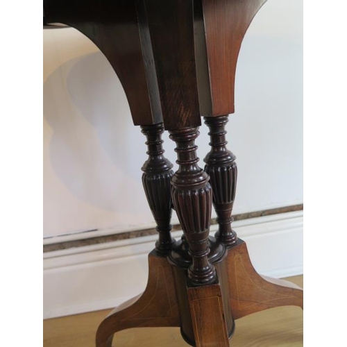 113 - An Edwardian fine rosewood tripod table with inlaid shaped top on three turned and reeded column and... 