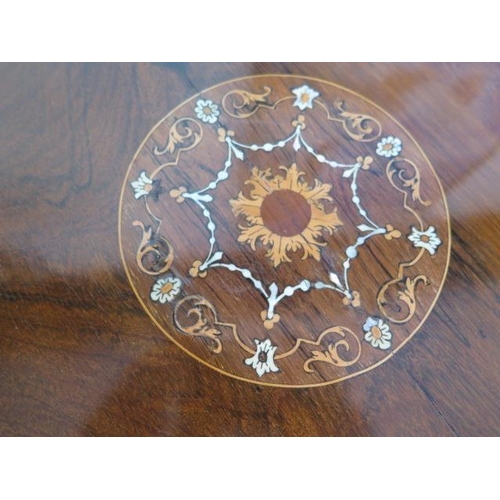 113 - An Edwardian fine rosewood tripod table with inlaid shaped top on three turned and reeded column and... 