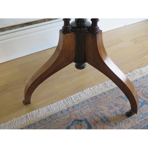 113 - An Edwardian fine rosewood tripod table with inlaid shaped top on three turned and reeded column and... 