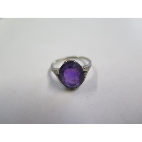 622 - A platinum amethyst ring, amethyst approx 11.5mm x 10mm x 6mm, set with small diamonds to the should... 