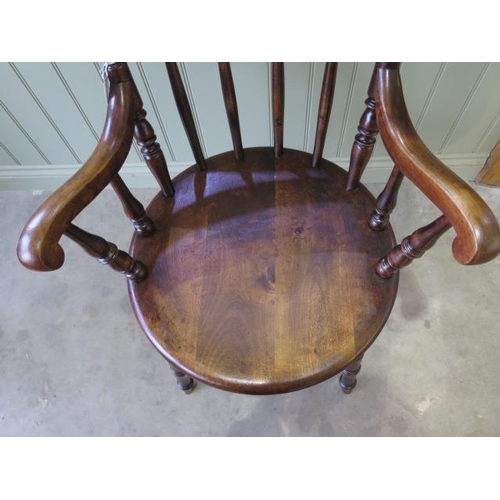 96 - A 19th century penny seat Windsor armchair in good polished condition