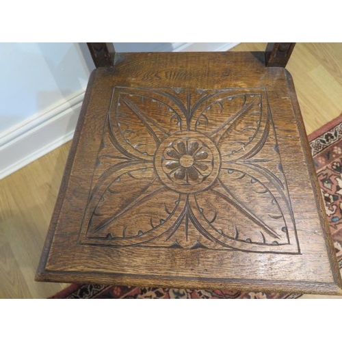 85 - A Victorian carved oak hall chair, 108cm tall x 46cm wide