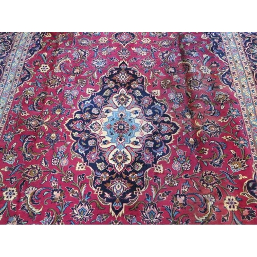 254 - A hand knotted woollen kashan rug, 3.60 x 2.42m